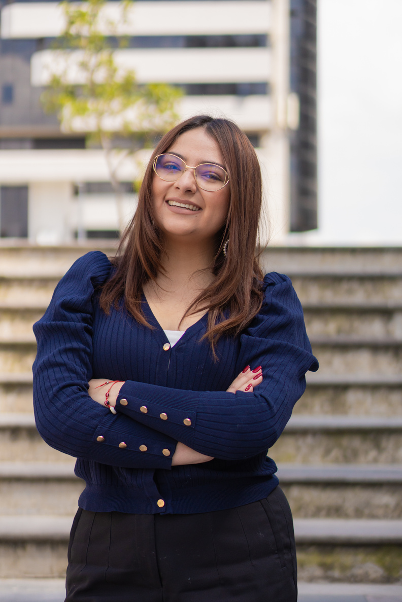 Selective focus shot of an Entrepreneurial young Hispanic woman outside her workplace